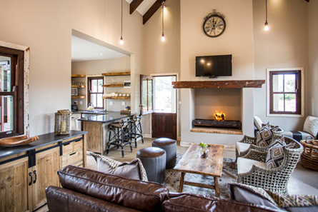 livingroom fireplace couches luxury 2 bedroom villa 2
